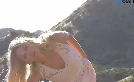 Charming Blonde Seductress Delights Outdoors with Erotic Sessions